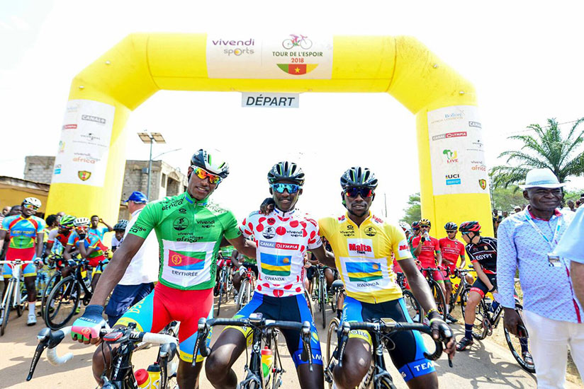 Stage 3 winner Samuel Mugisha (middle) and Joseph Areruya (right) before the start of stage 4 on Sunday afternoon. / Courtesy