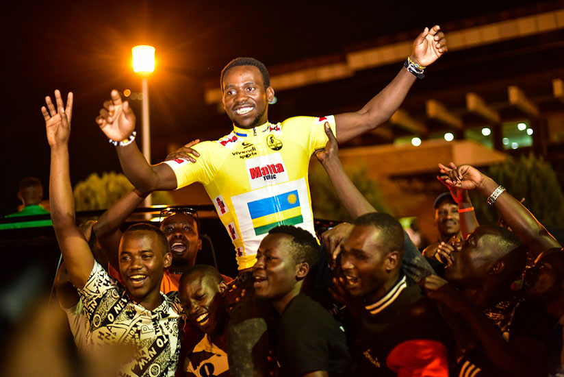 Champion Joseph Areruya was carried in the air by fans.