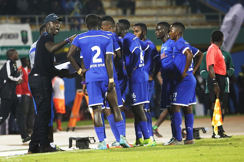 Rayon Sports head coach Olivier Karekezi gives instructions to his players during the match. Samuel Ngendahimana