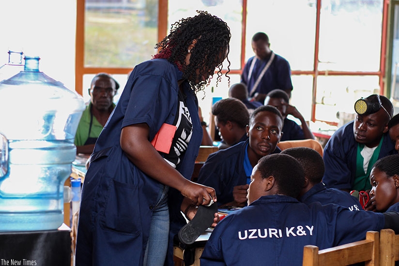 Uzuri K & Y employees in the process of making shoes.