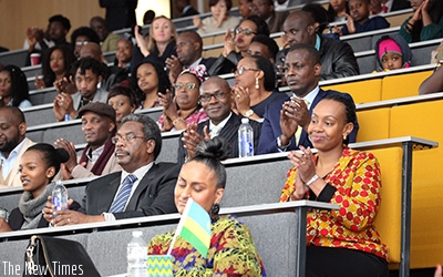 High Commissioner Karitanyi (R) and other participants applaud the performers. Courtesy.