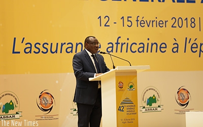 Finance minister Claver Gatete delivers his remarks at the 42nd General Assembly of the Federation of African National Insurance Companies in Kigali yesterday. Timothy Kisambira. 
