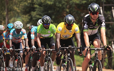 Rwandan rider Joseph Areruya (in yellow jersey) leads a peloton during stage six of Tour du Rwanda last year. The youngster went on to win the annual race and has since won two oth....