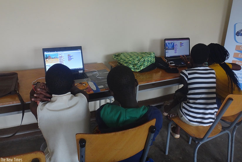 Children making computer-based animations at the creativty lab.   Inset: Some of the tools used at the Centre to introduce children to engeneering and computer science.  / Diane Mu....