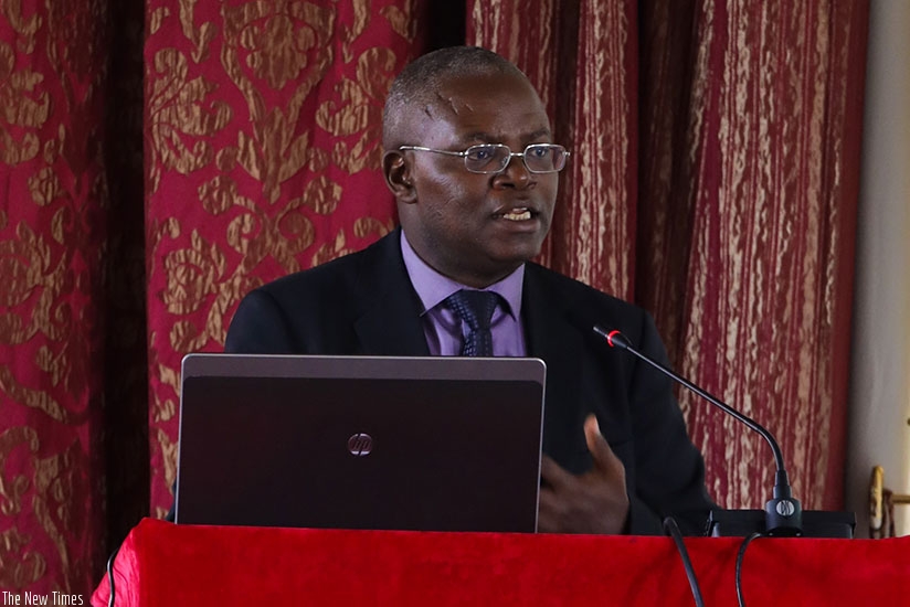 Apollinaire Mupiganyi, the executive director of Transparency International Rwanda, gives a presentation on the findings of the study on sexual-based corruption. Timothy Kisambira.