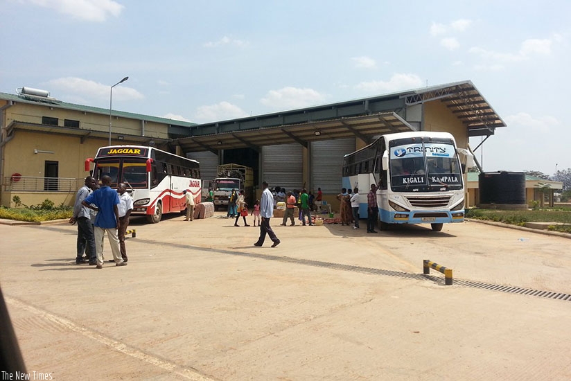 Rwandan and Ugandan buses carrying passengers wait to be cleared at Kagitumba border post. File.