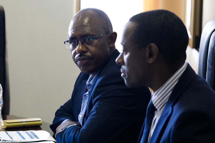 Minister Mutimura (L) before the lawmakers yesterday. Timothy Kisambira.