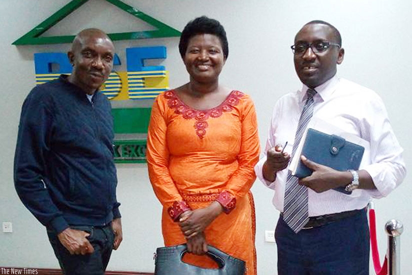 Mukanzigiye poses for a picture with RSE officials last week. / Courtesy.