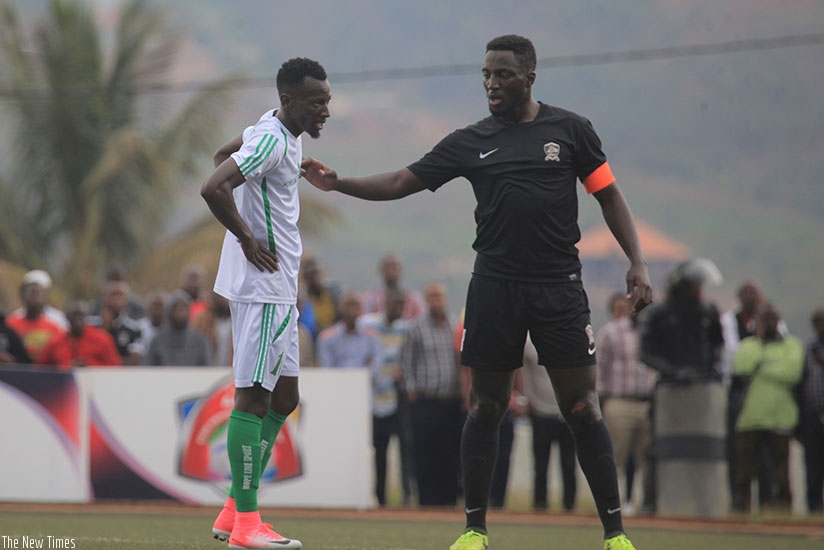 Mustafa Francis (left) and APR center back Herve Rugwiro. Samuel Ngendahimana.