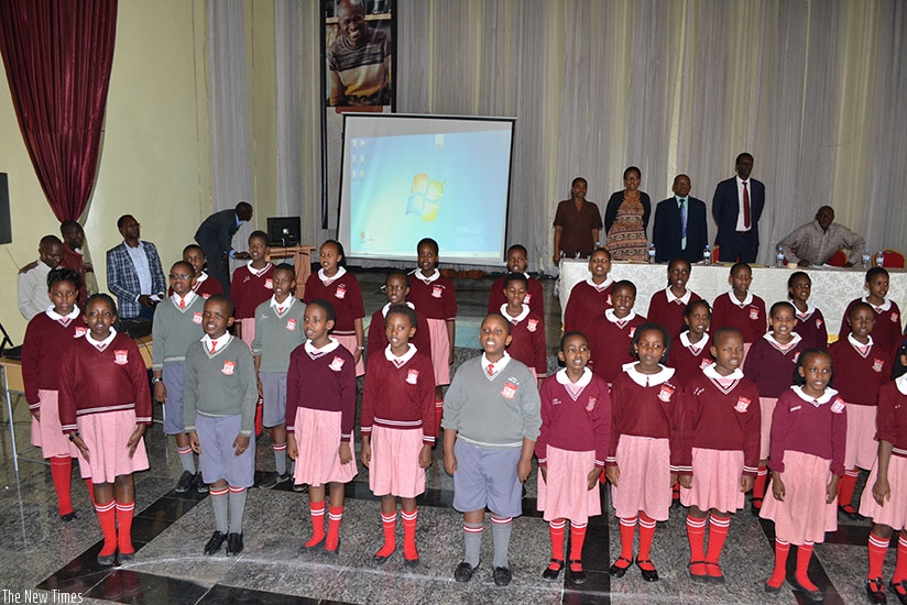 Mpeta (middle, front row) and other members of the school choir entertain guests at a school function. rn