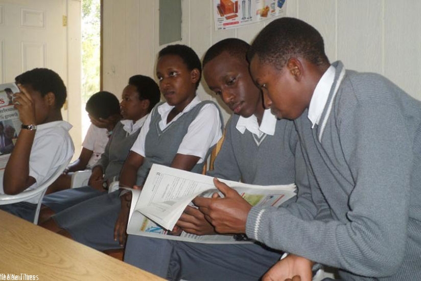 Students reading in a group. Group activities make the learning experience richer and more enjoyable.  / Lydia Atieno.