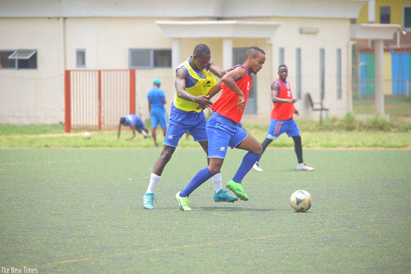 Rayonu2019s Gabriel Mugabo and Yannick Mukunzi during a training session on Monday at Nzove ground. Peter Kamasa