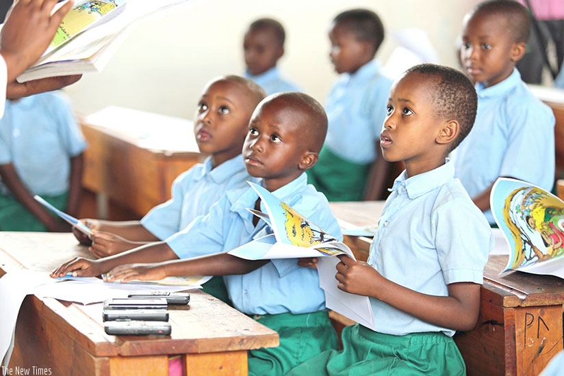 EP Kamashashi pupils listen to officials on the occasion of International Mother Tongue Day celebrations in Kicukiro District on Thursday. At the event, USAID, through its project,....