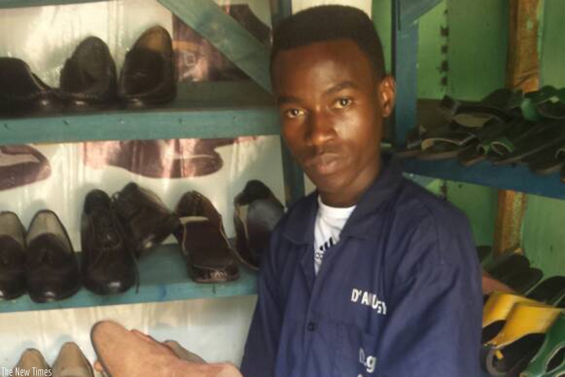 Uwimana at his workshop in Kimisagara. The shoemakeru2019s gross revenue is over Rwf2 million a month.  / Michel Nkurunziza.