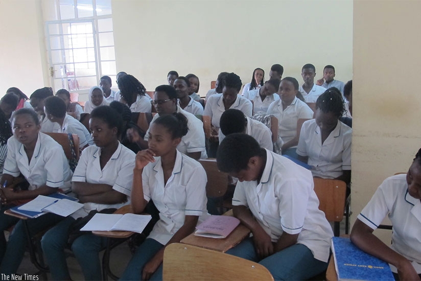Students follow the meeting at Gitwe University on friday.  / Photos by Francis Byaruhangarn