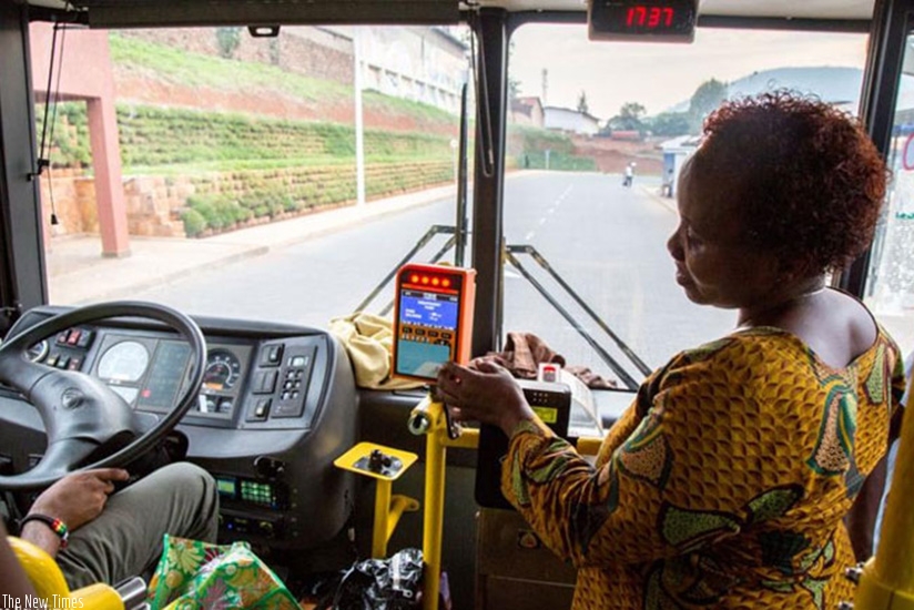 A passenger uses a Tap-and-Go card. File.