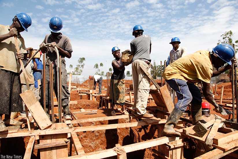 Casual labourers at a construction site in Kigali. Some workers at construction sites donu2019t wear protective gear which puts their safety in jeopardy. Timothy Kisambira.
