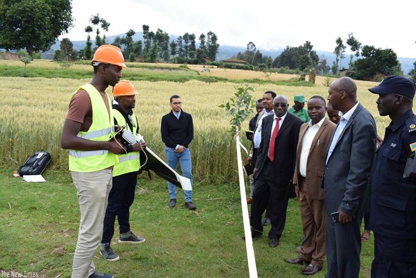 Officials being explained to how the drone technology works, in Musanze yesterday. Courtesy.