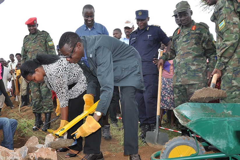 Defence minister James Kabarebe lays a foundation stone for the construction of the school at Akayange in Nyagatare District in May 2017. Kelly Rwamapera. 