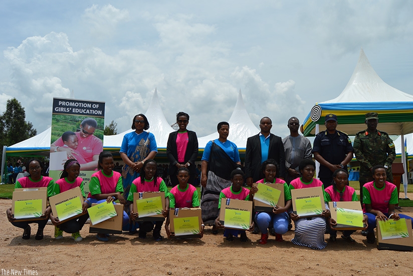 The 10 BPGs  who were awarded, take a group photo with the distinguished guests during the event, which was held on the sidelines of the International Womens Day celebrations held ....
