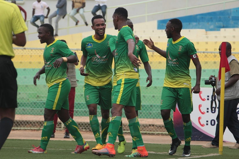 AS Kigali celebrate after taking the lead against Musanze FC on Monday. The hosts won the game 4-3 to return to top of the league table. Courtesy