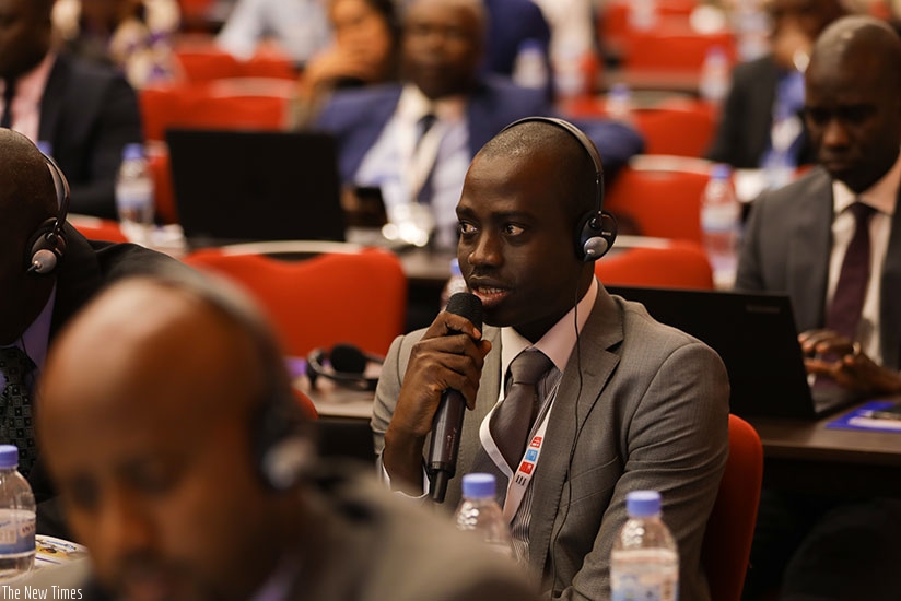 A participant asks a question at the on-going African Union of Broadcasting  meeting in Kigali yesterday. (All photos by Timothy Kisambira)