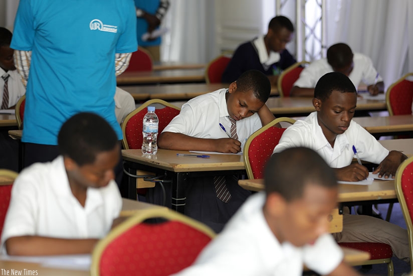 Students sit an examination during a Mathematics competition that attracted students from 10 science secondary schools in the country, yesterday.(Timothy Kisambira)
