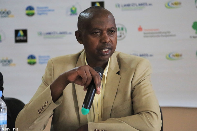 Rwanda Cooperatives Agency chairman Augustin Katabarwa addresses journalists in Kigali yesterday. Sam Ngendahimana.