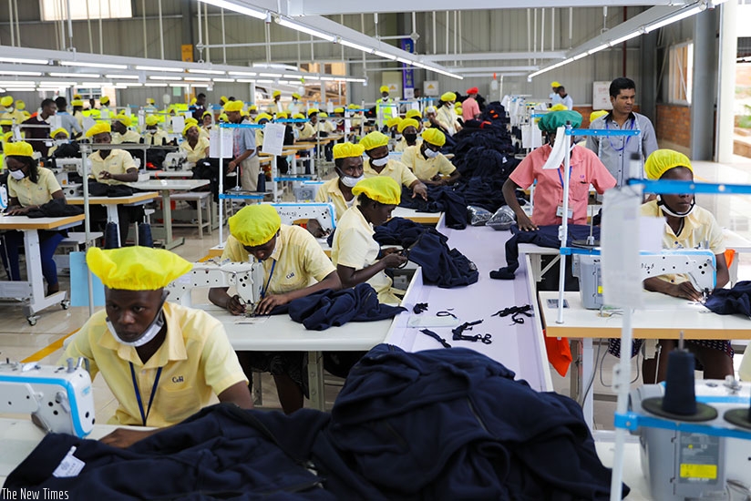 Workers at C&H garment factory at the Kigali Economic Zone making outfits. The continental free trade agreement, to be signed on Wednesday, is meant to ease movement of goods acros....