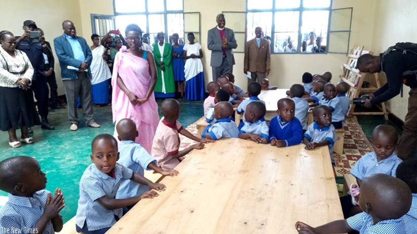 Anglican Church leaders touring  the inaugurated classrooms. (Diane Mushimiyimana)