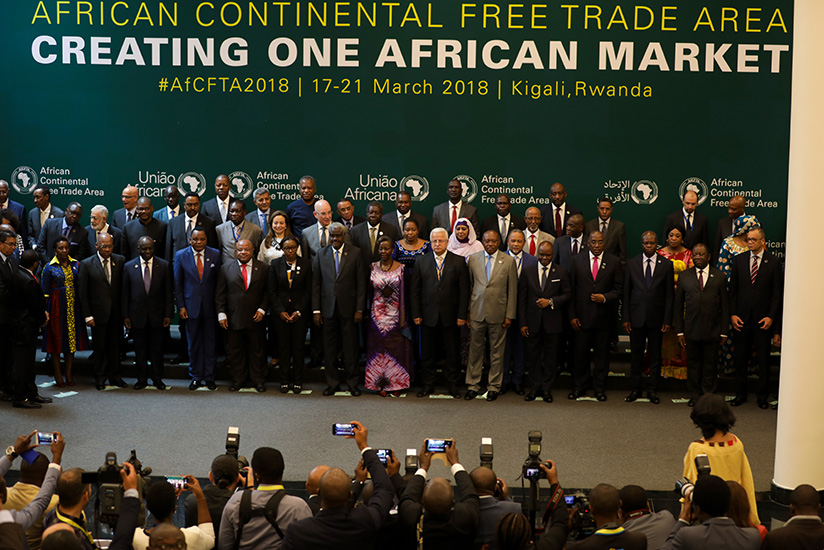 Delegates pose for a group photo after the opening session of the Executive Council of Ministers of African Union meeting in Kigali. Timothy Kisambira. 