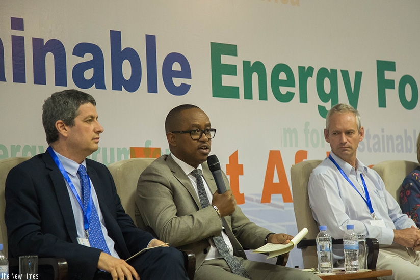 Dr Twagirishema (C) Chairman, Energy Private Developers, speaks on a panel at the meeting yesterday. Nadege Imbabazi. 