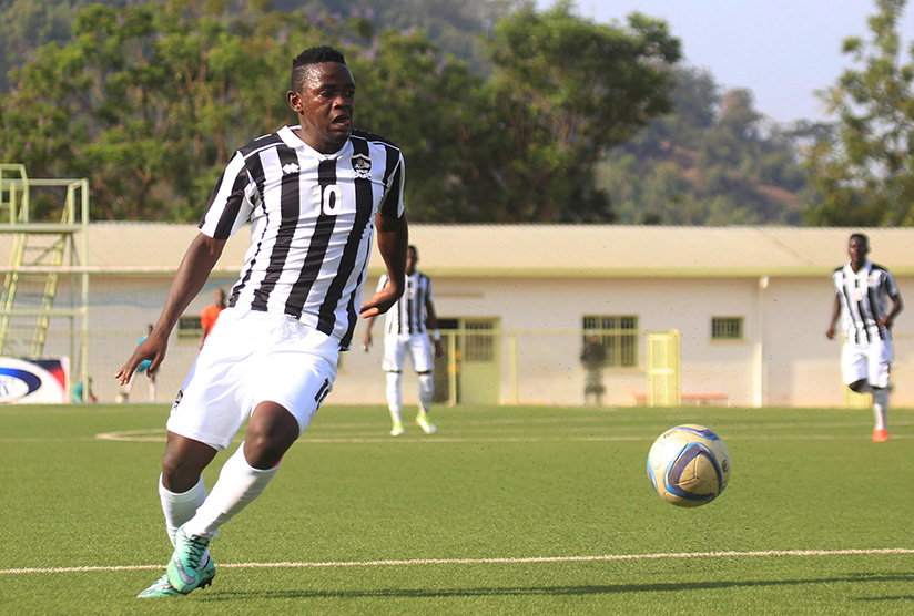 Midfielder Muhadjili Hakizimana controls the ball in the recent league match against Musanze, Army Side is to face ESPOIR FC today. (Sam Ngendahimana)