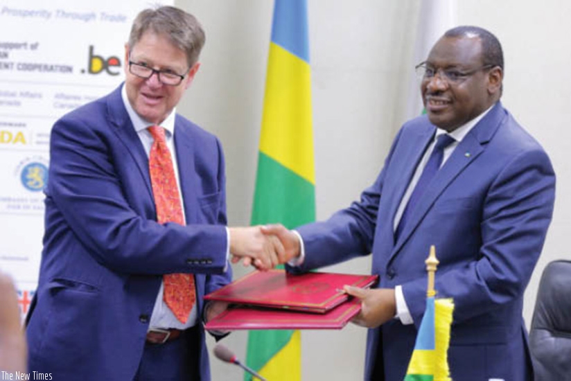 Gatete (R) and Matsaert after signing the agreement.  (Courtesy)