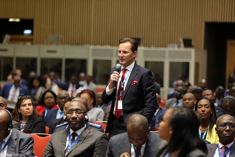 A participant asks a question at the CFTA summit in Kigali. (Timothy Kisambira)