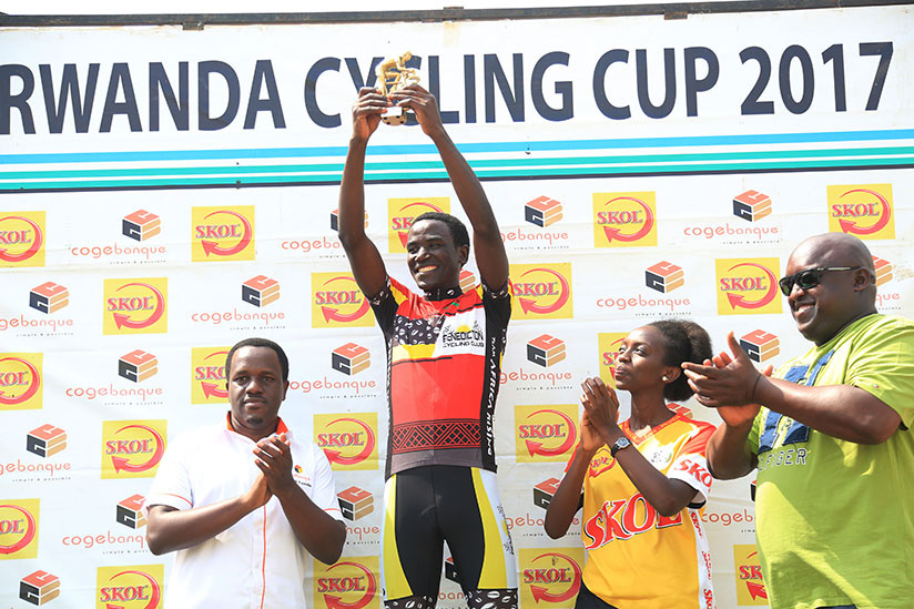 Patrick Byukusenge holds the trophy as the 2017 Rwanda Cycling Cup champion. S. Ngendahimana