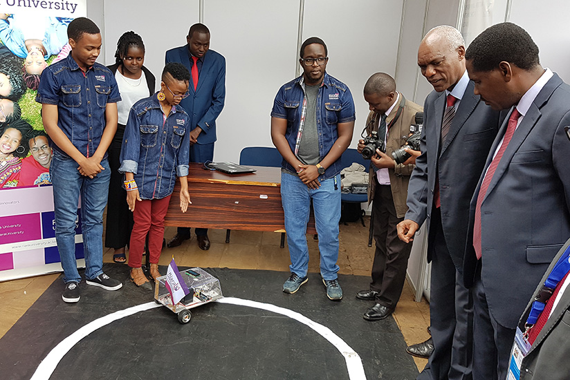 Kenya's Cabinet Secretary for East African Community affairs Peter Munya (third right) and Alexander Lyambabaje, the Executive Secretary of the Inter University Council for East Af....