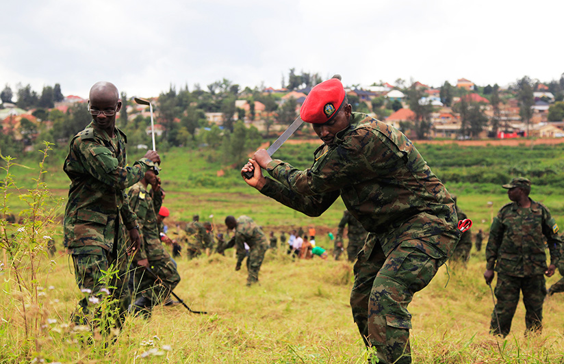 Rwanda Defense Force participating in umuganda (community work) during Army Week in 2017 in Kicukiro District last year. / Sam Ngendahimana