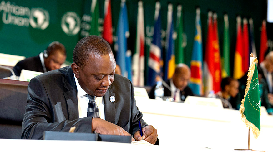 President Uhuru Kenyatta signs the CFTA deal in Kigali last week. Net