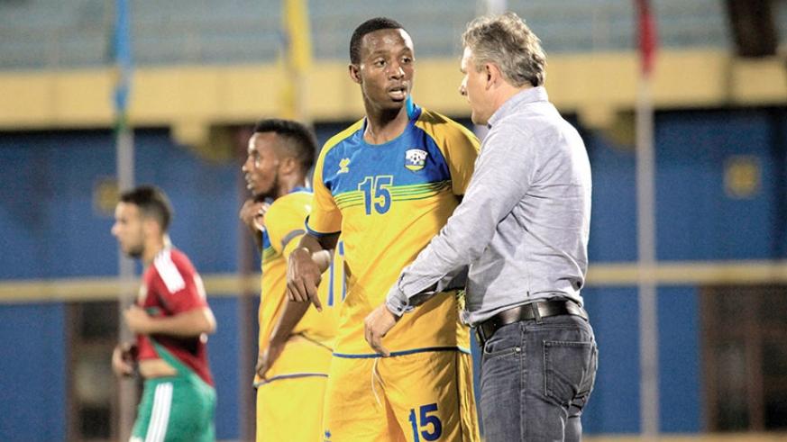 Former head coach, Hey gives instructions to defender Emery Bayisenge (File)
