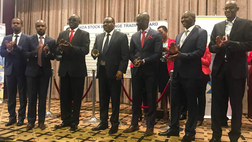 Gatete rings the bell to launch the new platform. / Frederic Byumvuhore.