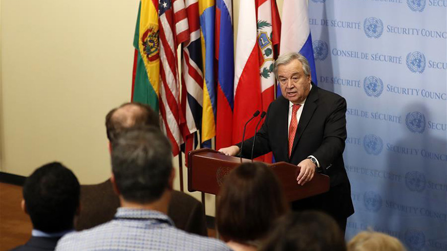 UN Secretary-General Antonio Guterres (Rear) speaks during a press encounter at the UN headquarters in New York, on March 29, 2018. UN Secretary-General Antonio Guterres said here Thursday that more than ever before, climate change is posing a great threat to humanity. (Xinhua/Li Muzi)