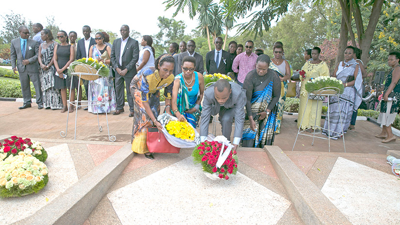 Family and friends lay a wreath on the graves of the victims of the 1994 Genocide against Tutsi. Nadege Imbabazi. 