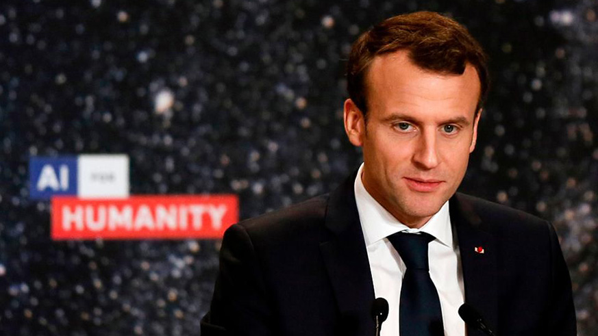 French President Emmanuel Macron delivers a speech during the 'Artificial Intelligence for Humanity' event in Paris on March 29, 2018. The French president is to unveil on March 29 a bold plan to make France a centre of reference for artificial intelligence research, aimed at drawing homegrown and foreign talent in a field dominated by US and Chinese players. / Internet photo