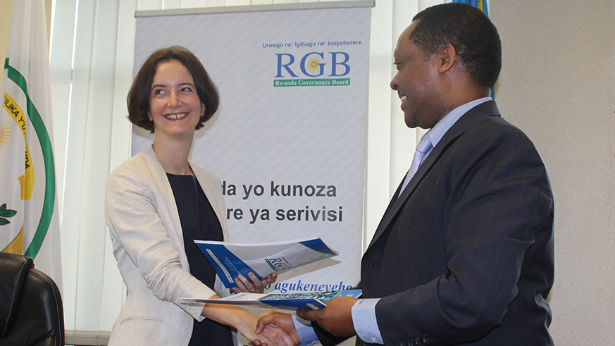 Prof Shyaka and  Metcalf after signing the Memorandum of Understanding yesterday. / Courtesy