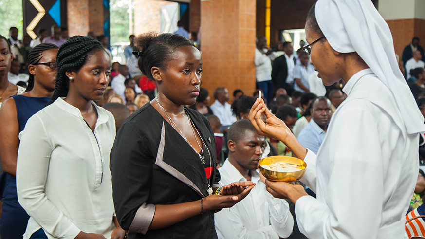 Christians at St Michel during Holy Communion. / Nadege Imbabazi