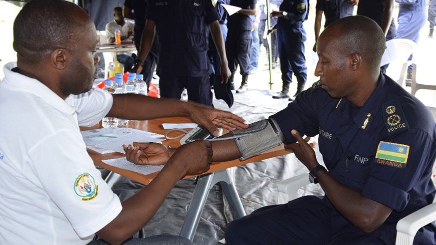 ACP David Butare donating blood during the event at Police Headquarters in Kacyiru. / Courtesy