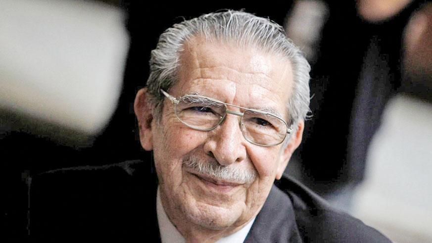 Efrain Rios Montt smiles during his genocide trial at the Supreme Court of Justice in Guatemala City, in 2013. Net photo.