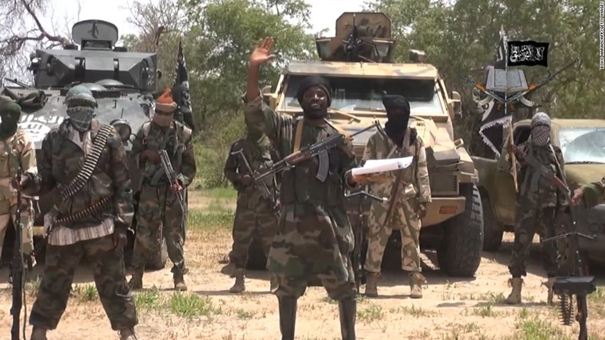 Boko Haram fighters attacked a military base and two surrounding villages near the flashpoint Nigerian city of Maiduguri overnight, killing at least 18 people and wounding 84.