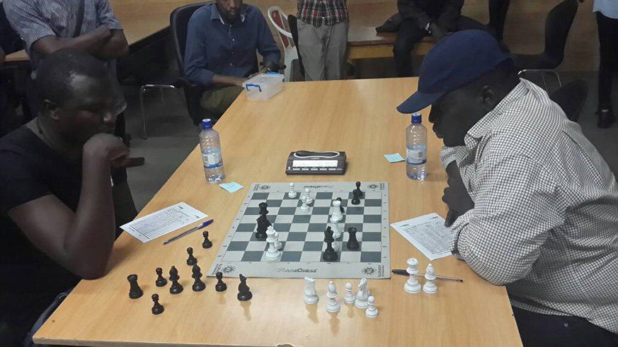 Naftaly Wachira Mwangi pulled all possible strings but eventually succumbed against CM Godfrey Kabera (right) in this round six encounter which dragged on till very late Sunday night. (J Karuhanga)